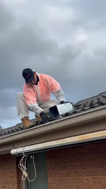 Fitting a one way door on a tiled roof